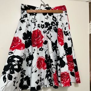 Black/Rose Midi Skirt Size S Used in good condition.